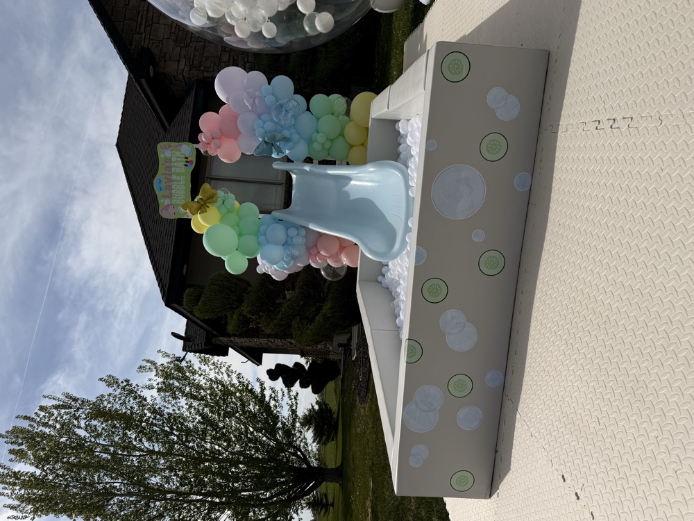 Bubble bath-themed slide and ball pit