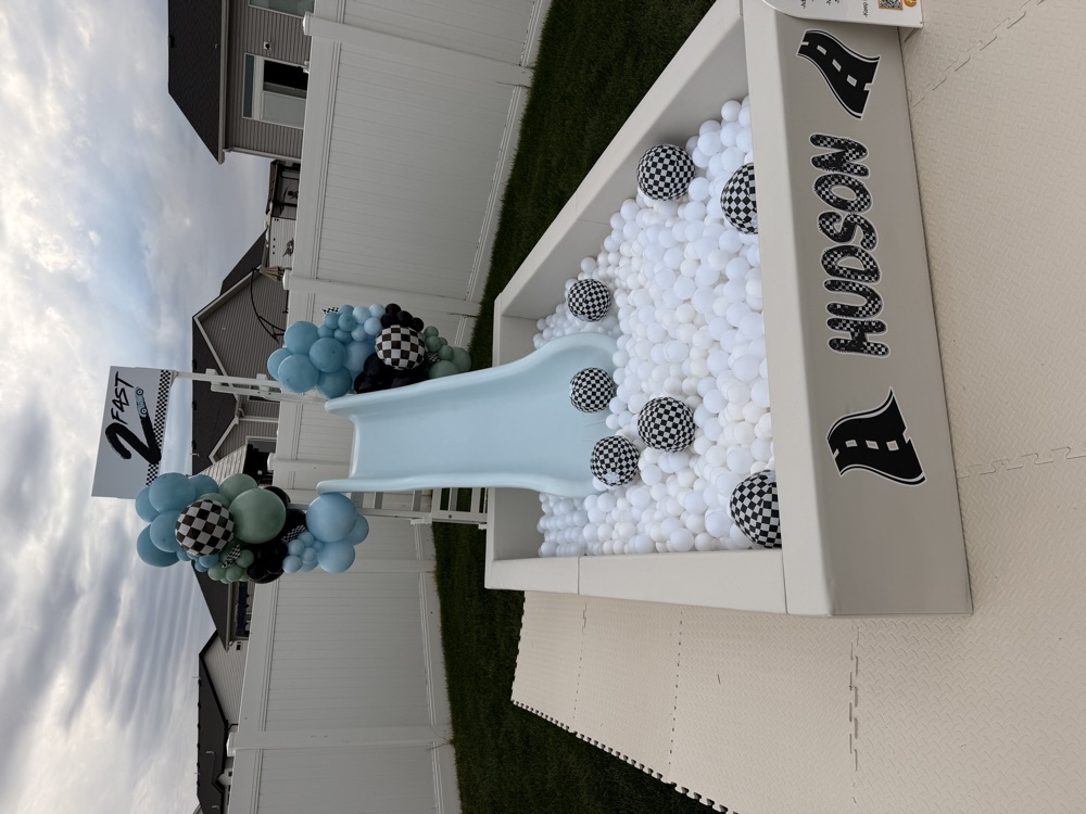 Race car-themed slide and ball pit