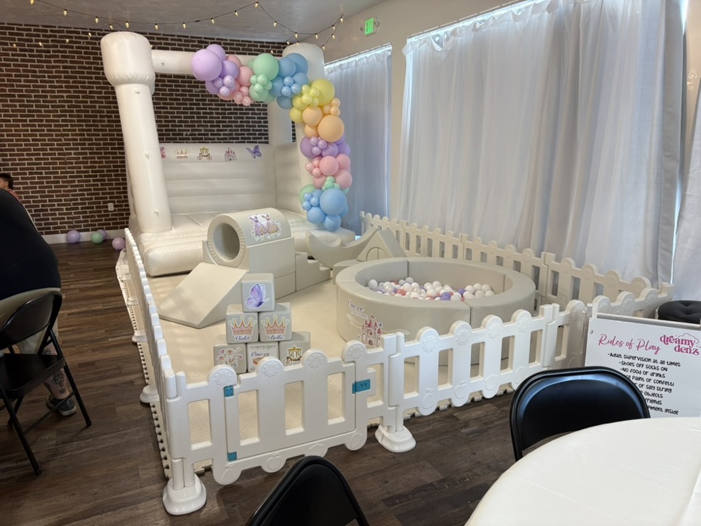 Princess-themed soft play set with balloon garland